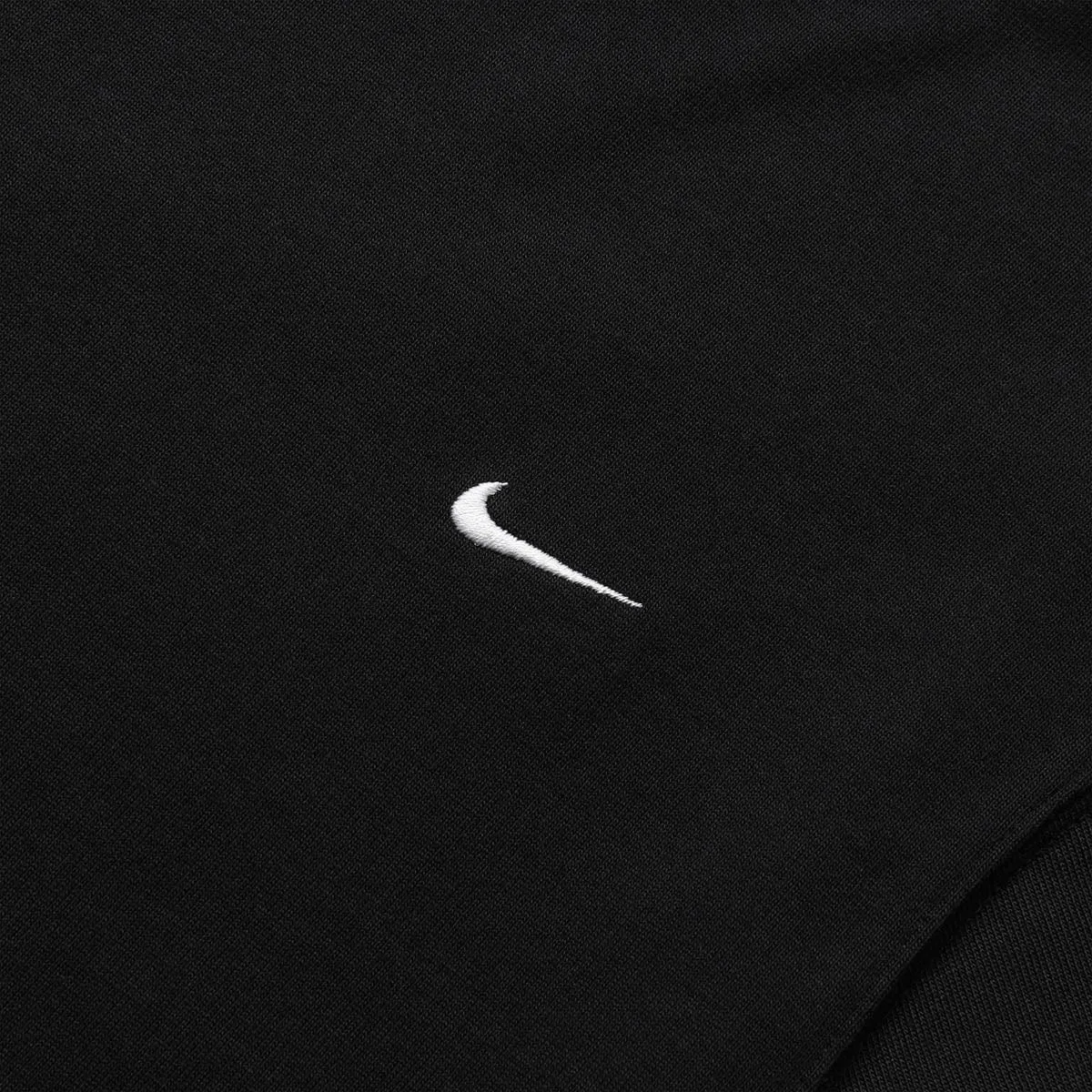 SOLO SWOOSH TOP